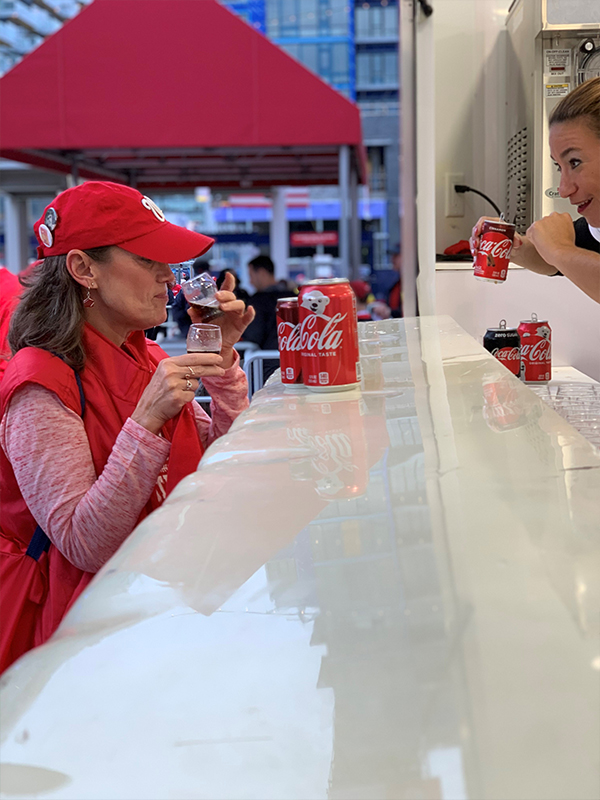 Taste testing at a Coca Cola Coke Trailer built by Turtle Transit to resemble a large cooler.